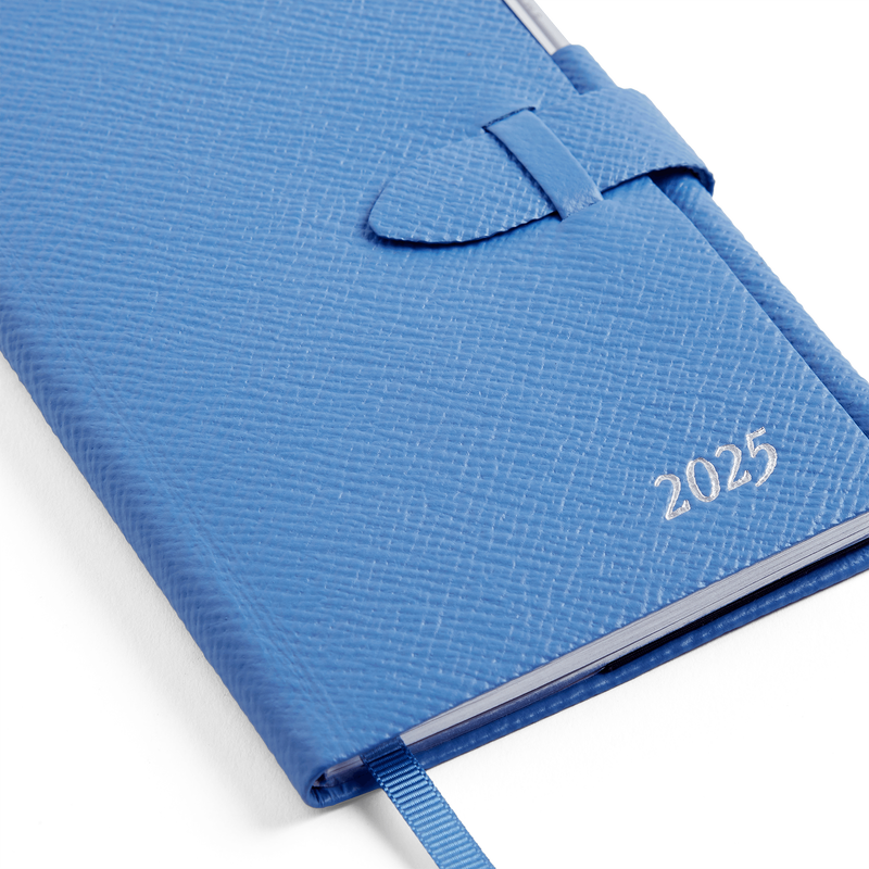 Agenda Panama 2025 con layout settimanale e matita